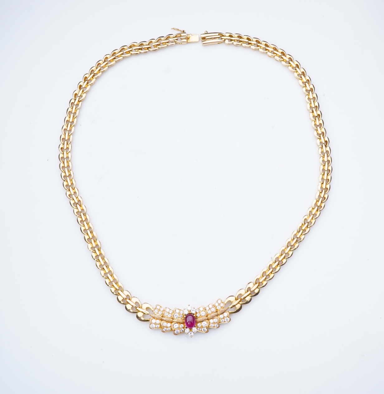 A diamond and synthetic ruby necklace